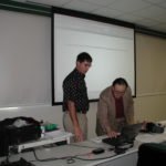 CW preparing PC for co-teaching presentation at training program for Universidad Interamericana de Puerto Rico